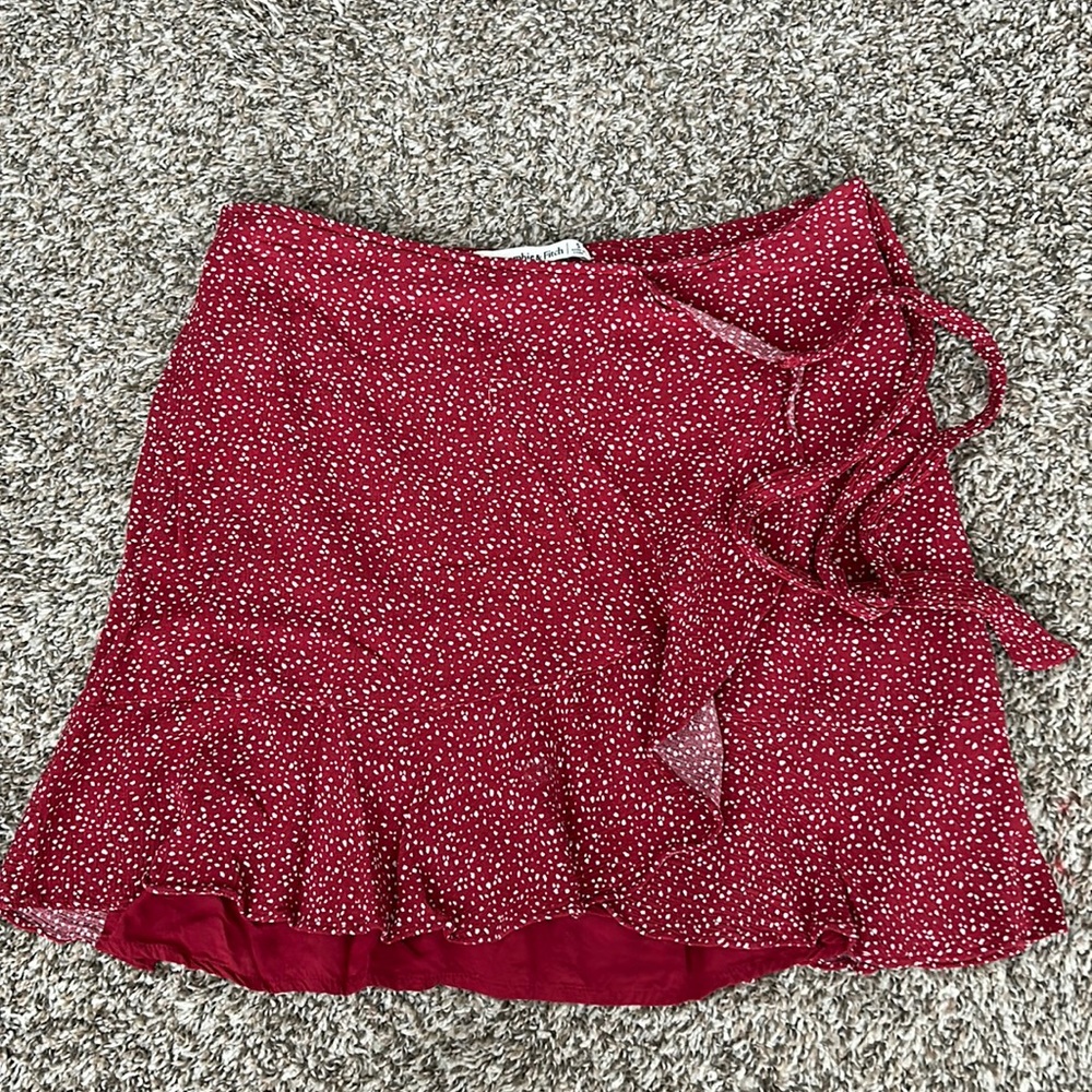 Abercrombie mini skirt. Size small & ties across the side